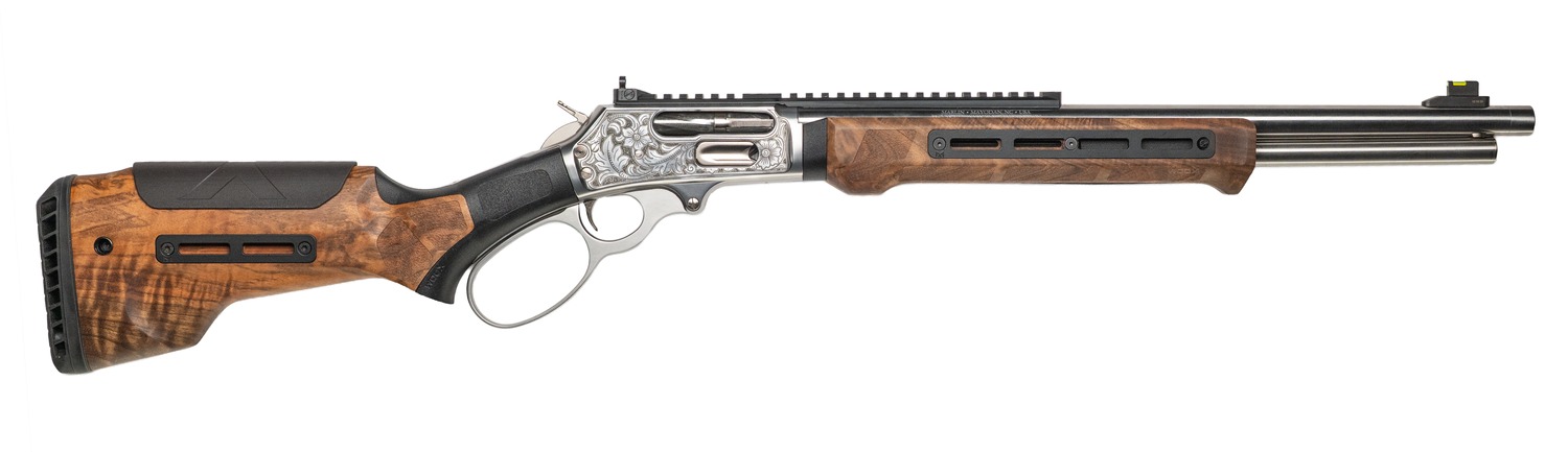 Engraved stainless lever-action rifle with walnut stock and threaded barrel, right side view