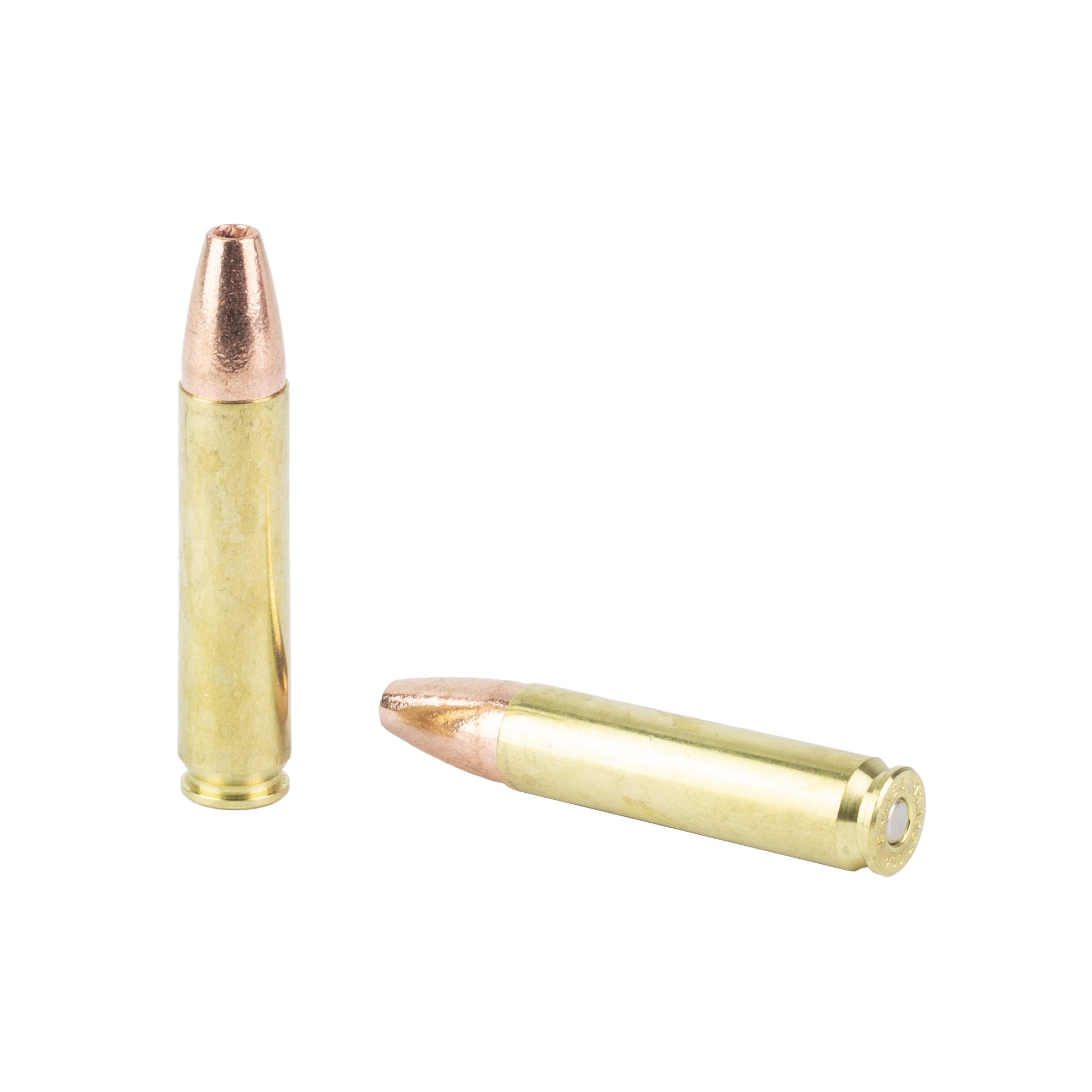 Two Barnes VOR-TX brass cartridges with copper bullets, one standing and one lying down