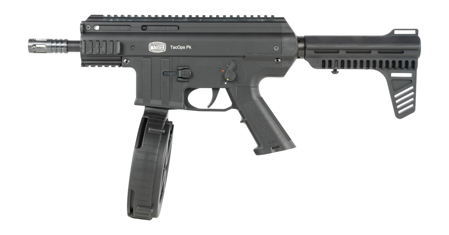 Mauser TacOps PK pistol with drum magazine, left side view