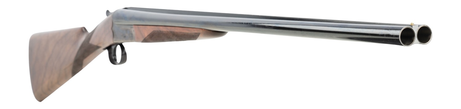 Dickinson ES18 side-by-side shotgun angled view showing twin barrels and walnut stock