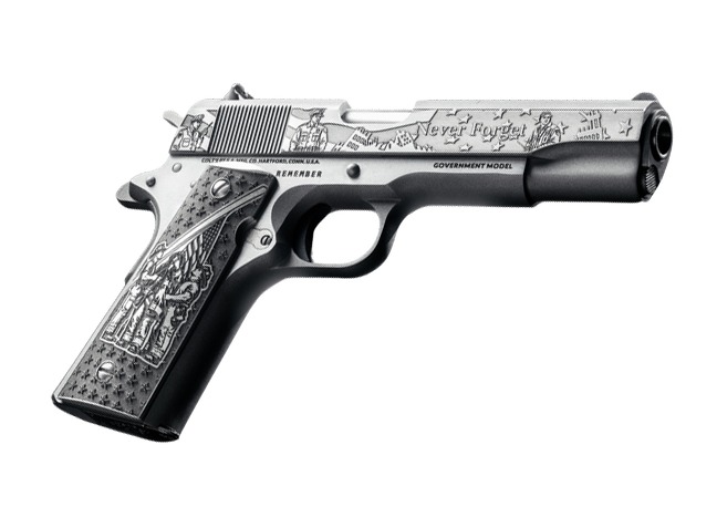 Engraved stainless CNC Colt 1911 Government pistol with Remember 9/11 slide and grips on white background