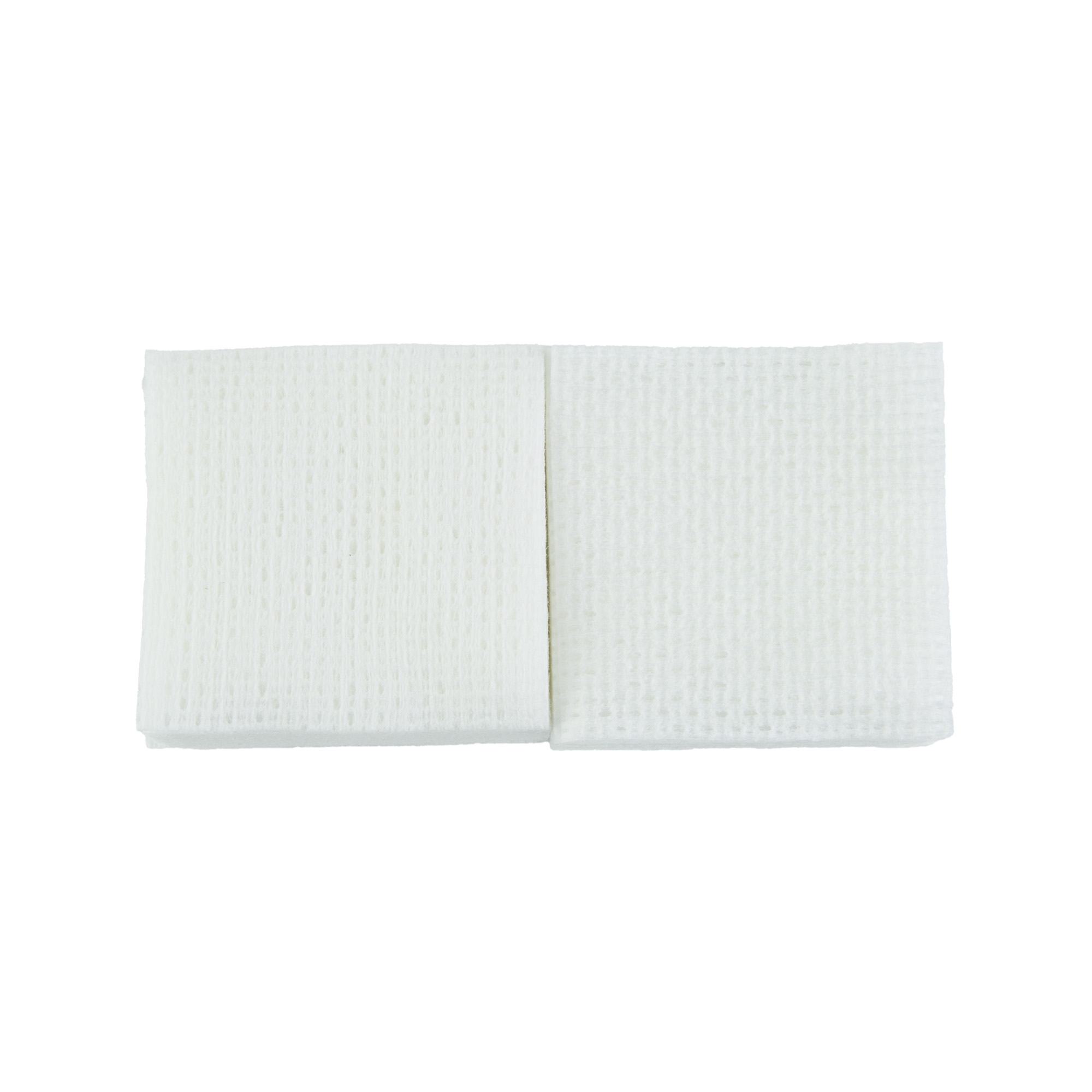 Two folded white cleaning patches side by side