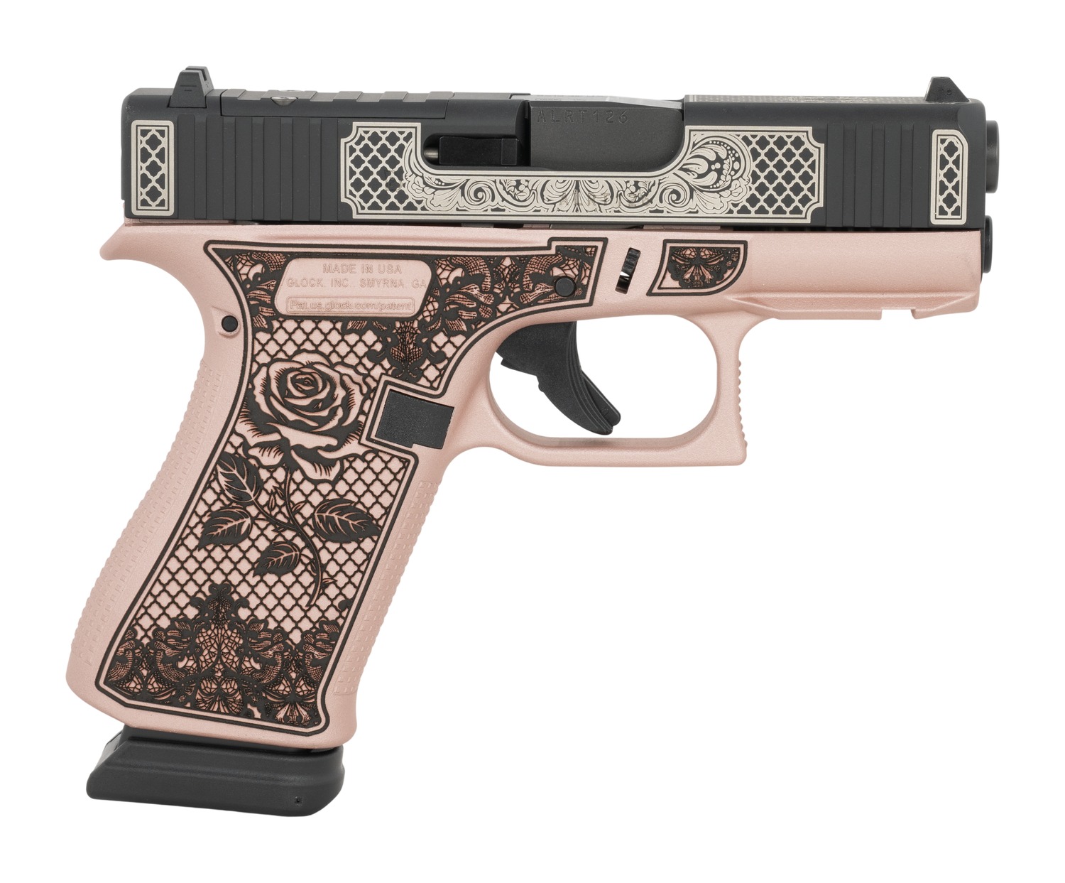 Glock 43X pistol with pink frame and black engraved slide, right side angled view
