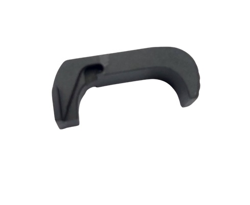 Black extended magazine release for Glock 43X and 48 on a plain background